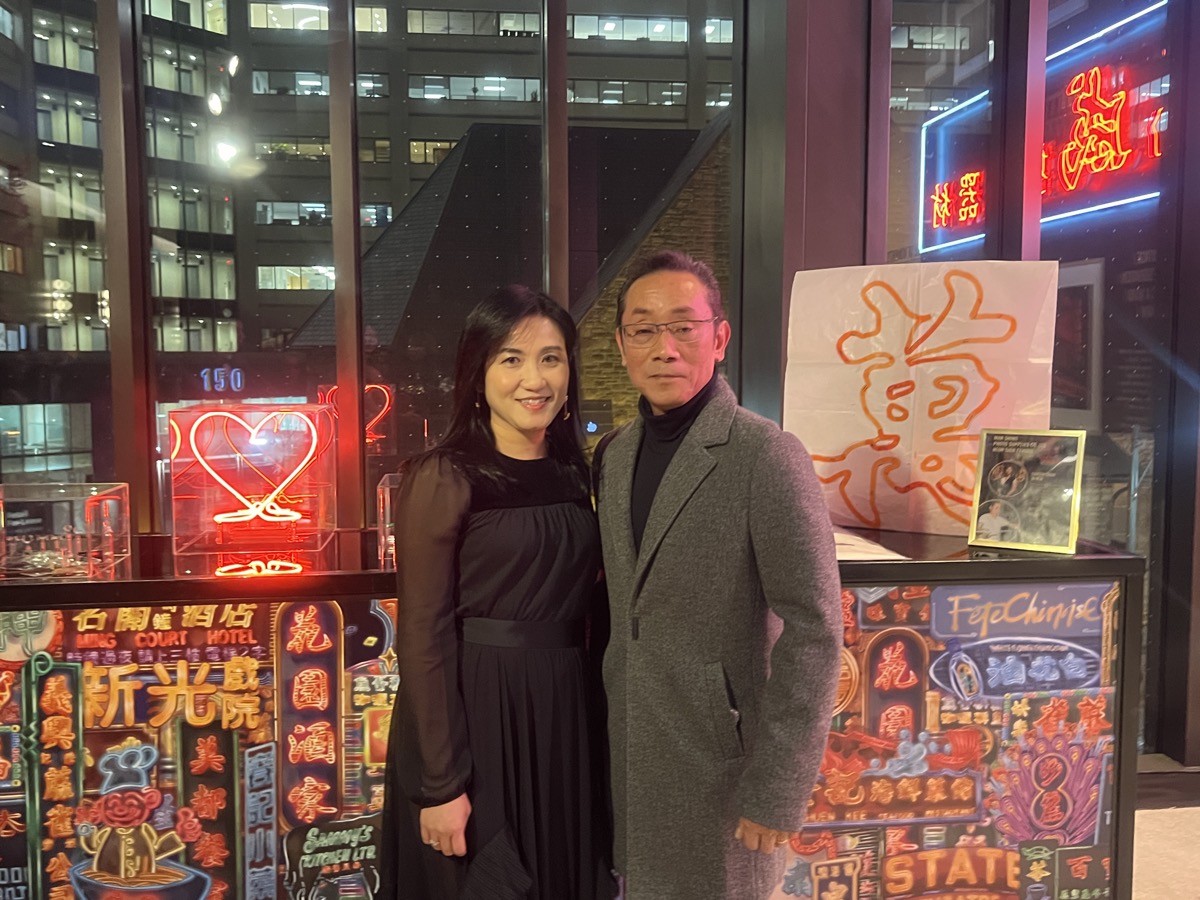 The Director of the Hong Kong Economic and Trade Office (Toronto), Ms Emily Mo (left), pictured with Master Wu Chi-kai (right), neon tube artisan from Hong Kong.